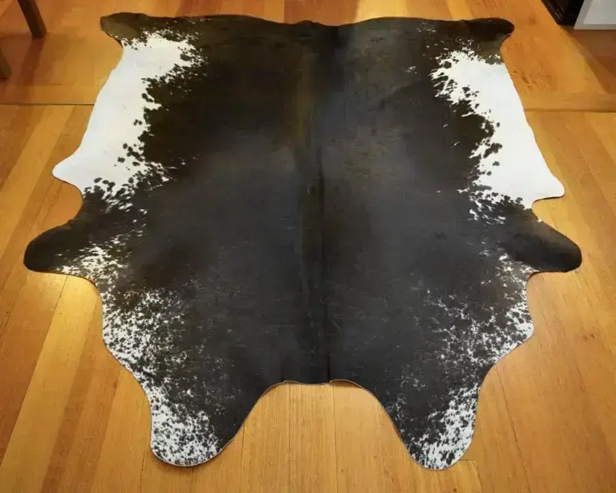 A Dusky Charcoal Black Framed in Speckled White - A Big & Beautiful Cowhide Rug