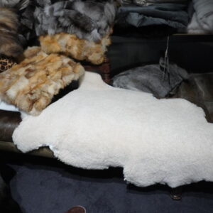 Curly Cotswold Sheepskin - The Softest of Leathers - The Warmest of Wools