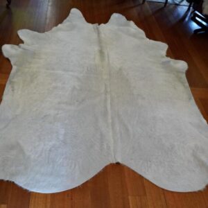 A British White  - A Rare Breed Cowhide Rug